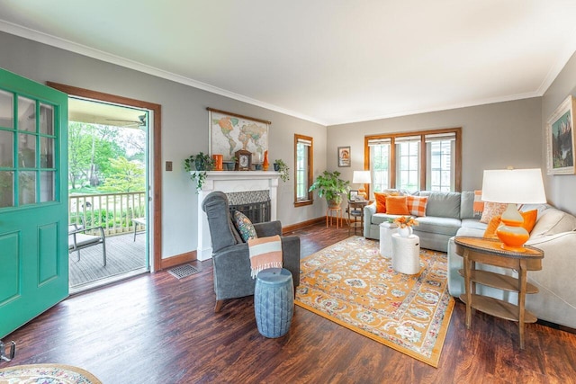 1674 Melrose Ave, Columbus, OH 43224 - living room with wood finished floors, ornamental molding, a fireplace, and baseboards