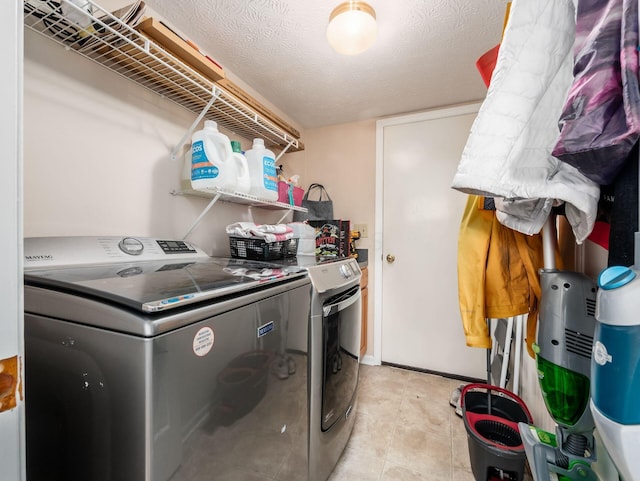 1249 Sea Shell Dr, Westerville, OH 43082 - laundry room with washing machine and dryer and light tile patterned floors