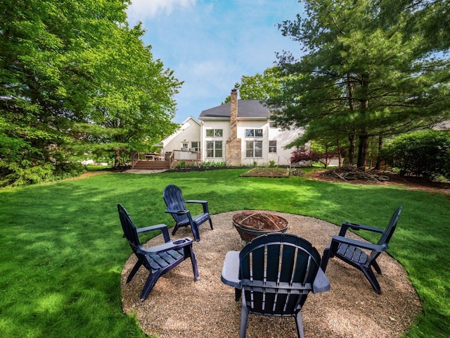 1249 Sea Shell Dr, Westerville, OH 43082 - view of green lawn featuring a fire pit and a deck