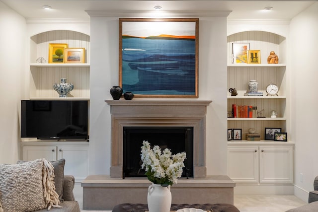 2060 Fontenay Pl, Upper Arlington, OH 43220 - living area featuring built in shelves and a fireplace with raised hearth