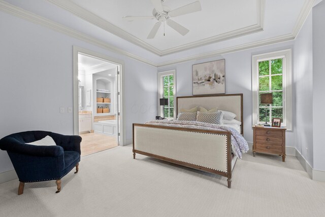 2060 Fontenay Pl, Upper Arlington, OH 43220 - bedroom with crown molding, light carpet, a tray ceiling, connected bathroom, and ceiling fan