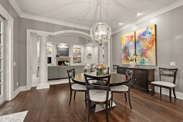 2060 Fontenay Pl, Upper Arlington, OH 43220 - dining area featuring built in shelves, crown molding, baseboards, dark wood finished floors, and a fireplace