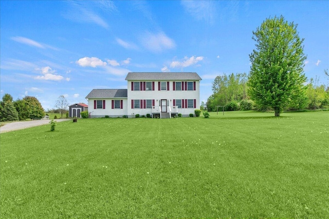 10746 State Route 287, Zanesfield, OH 43360 - colonial home featuring a front yard and a shed