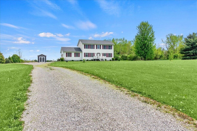10746 State Route 287, Zanesfield, OH 43360 - colonial-style house featuring gravel driveway and a front lawn