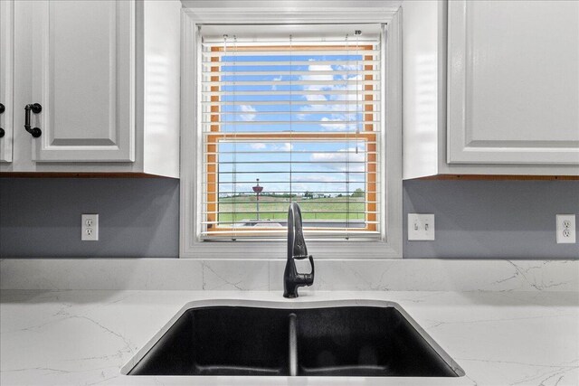 10746 State Route 287, Zanesfield, OH 43360 - kitchen view of a sink and light stone counters