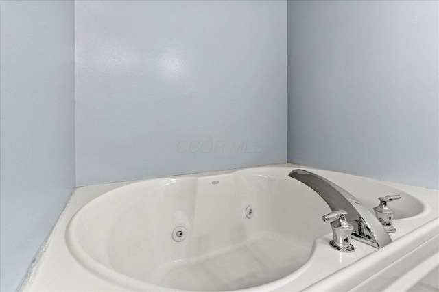 10746 State Route 287, Zanesfield, OH 43360 - full bathroom featuring a jetted tub
