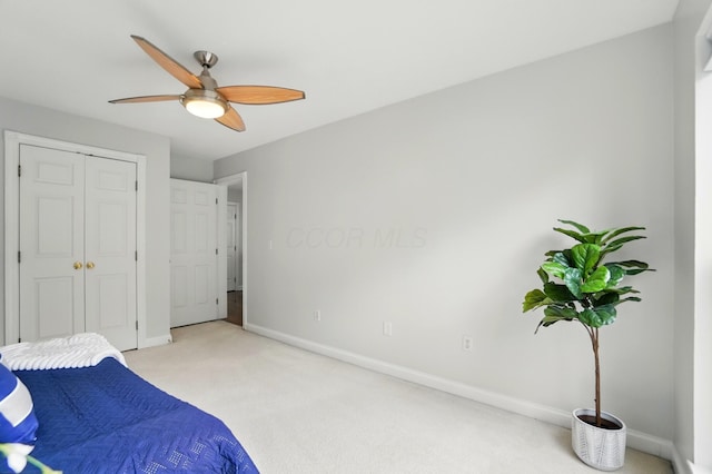 1077 Michigan Ave Unit 9, Columbus, OH 43201 - bedroom featuring baseboards, light colored carpet, a ceiling fan, and a closet
