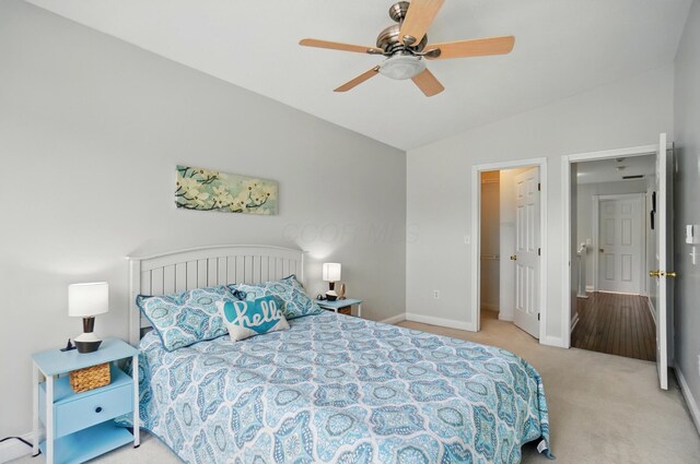 1077 Michigan Ave Unit 9, Columbus, OH 43201 - carpeted bedroom with lofted ceiling, baseboards, a ceiling fan, and a closet