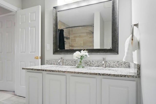 1077 Michigan Ave Unit 9, Columbus, OH 43201 - full bathroom with double vanity and curtained shower