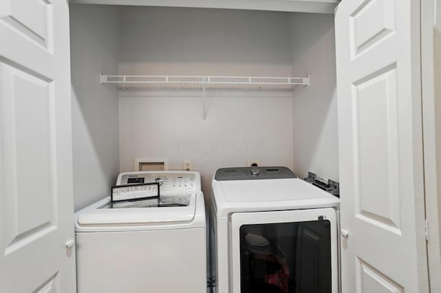 1077 Michigan Ave Unit 9, Columbus, OH 43201 - laundry area featuring washer and clothes dryer
