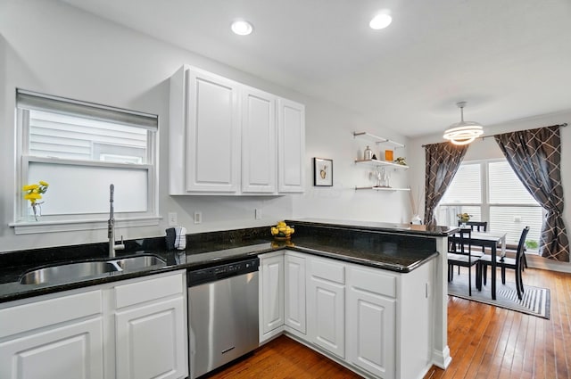 1077 Michigan Ave Unit 9, Columbus, OH 43201 - kitchen featuring dishwasher, a sink, a peninsula, white cabinets, and recessed lighting