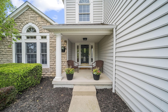 7257 Scioto Pkwy, Powell, OH 43065 - property entrance with a porch and stone siding