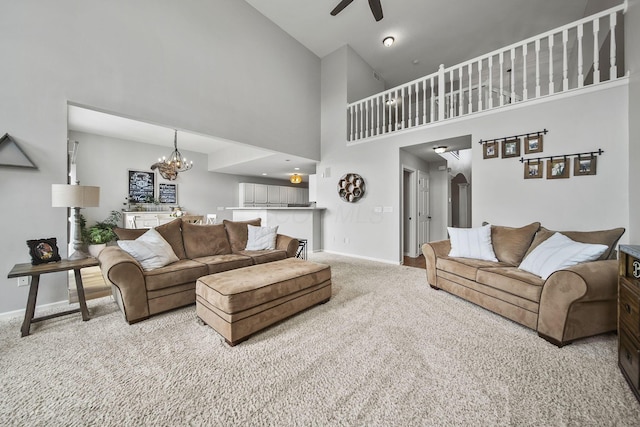 7257 Scioto Pkwy, Powell, OH 43065 - living room featuring carpet, a ceiling fan, a chandelier, baseboards, and high vaulted ceiling