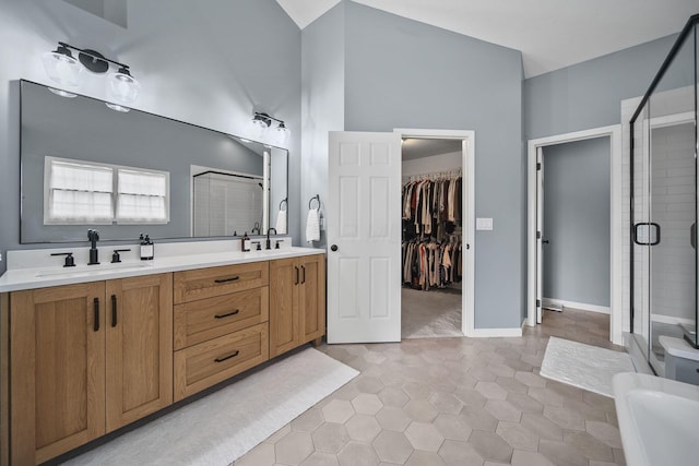 7257 Scioto Pkwy, Powell, OH 43065 - full bath with a shower stall, tile patterned flooring, double vanity, and a spacious closet