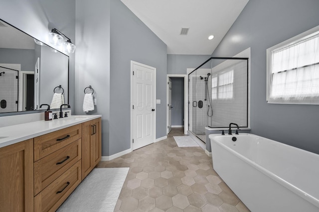 7257 Scioto Pkwy, Powell, OH 43065 - full bathroom with a stall shower, vanity, a freestanding tub, tile patterned flooring, and baseboards