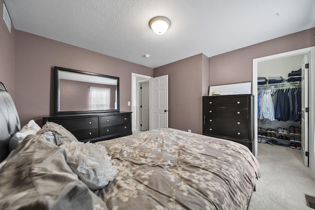7257 Scioto Pkwy, Powell, OH 43065 - bedroom with carpet, a closet, a spacious closet, and a textured ceiling