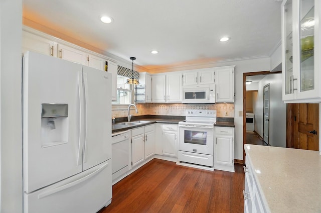 1407 Valley Dr, Marysville, OH 43040 - kitchen with white appliances, a sink, white cabinetry, tasteful backsplash, and dark wood-style floors