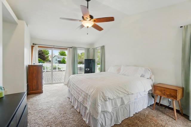 1407 Valley Dr, Marysville, OH 43040 - bedroom featuring access to exterior, vaulted ceiling, light colored carpet, and a ceiling fan