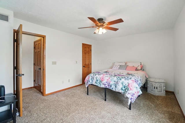 1407 Valley Dr, Marysville, OH 43040 - bedroom with carpet flooring, baseboards, and a ceiling fan