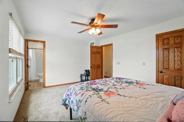 1407 Valley Dr, Marysville, OH 43040 - bedroom with carpet floors, ensuite bathroom, and a ceiling fan