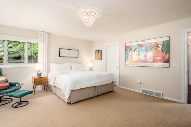2790 Alliston Ct, Columbus, OH 43220 - bedroom featuring light colored carpet, a chandelier, and baseboards