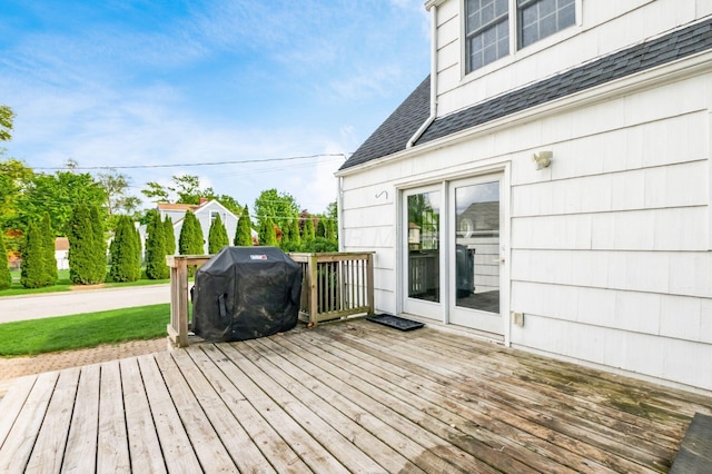 wooden deck with area for grilling