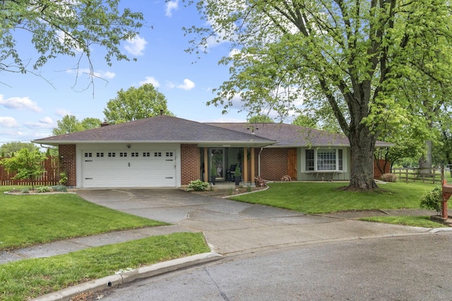 ranch-style home with driveway, a garage, and brick siding