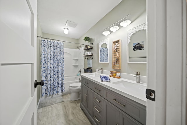 full bath featuring shower / bath combo, toilet, double vanity, and marble look tile flooring