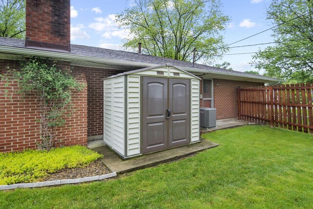 view of shed with central AC unit