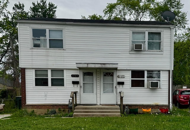 3785 Briggs Rd Unit 3785, Columbus, OH 43228 - view of front facade with a front lawn and cooling unit