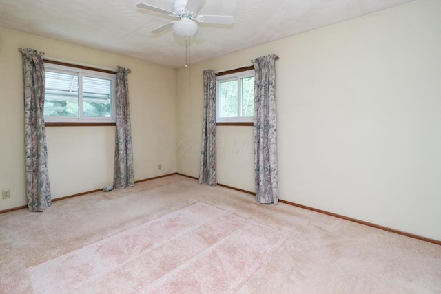 1294 Kings Corners Rd E, Mansfield, OH 44904 - carpeted spare room with baseboards and a ceiling fan