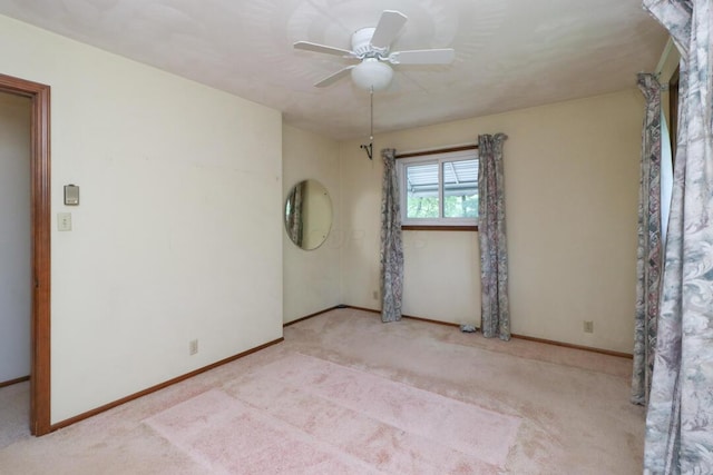 1294 Kings Corners Rd E, Mansfield, OH 44904 - unfurnished room with carpet floors, ceiling fan, and baseboards
