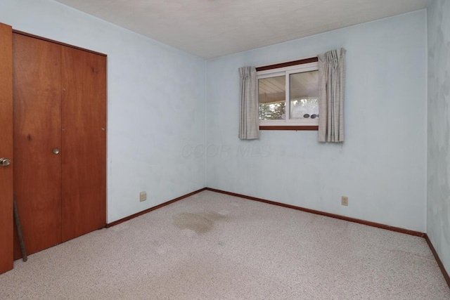 1294 Kings Corners Rd E, Mansfield, OH 44904 - unfurnished bedroom with carpet and baseboards
