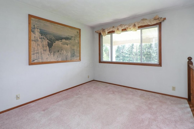 1294 Kings Corners Rd E, Mansfield, OH 44904 - carpeted empty room with baseboards