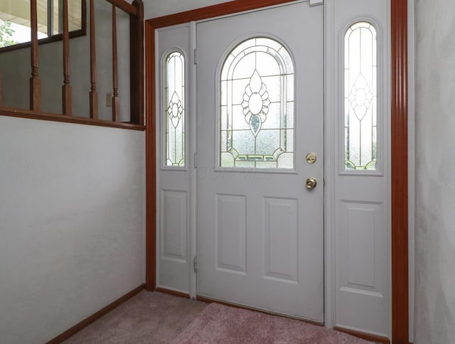 1294 Kings Corners Rd E, Mansfield, OH 44904 - carpeted entryway featuring healthy amount of natural light and baseboards