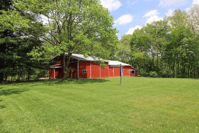 1294 Kings Corners Rd E, Mansfield, OH 44904 - view of grassy yard with a pole building and an outbuilding
