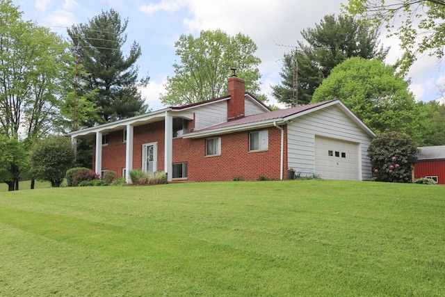 1294 Kings Corners Rd E, Mansfield, OH 44904 - view of home's exterior with brick siding, a chimney, a yard, and a garage