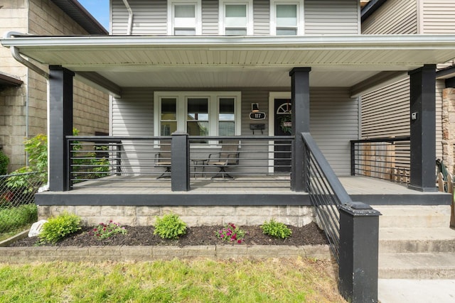 doorway to property with a porch