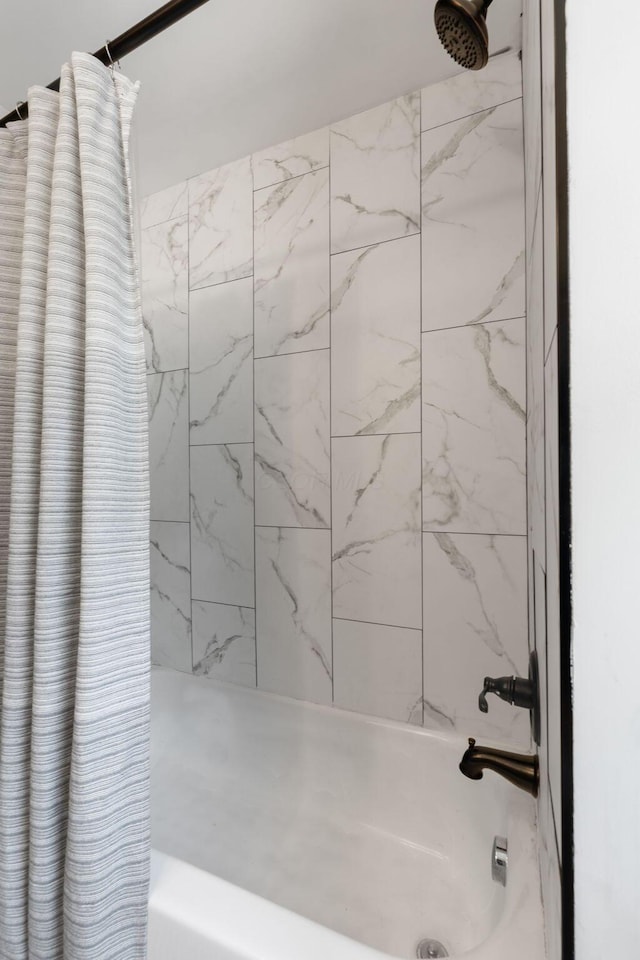 full bathroom featuring shower / bathtub combination with curtain