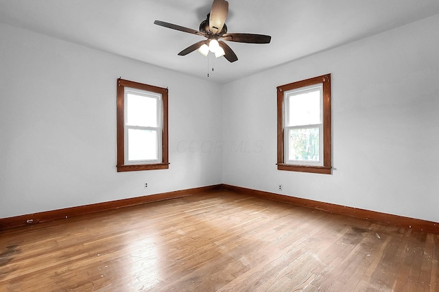 253 Robbins Dr, Newark, OH 43055 - empty room featuring plenty of natural light, light wood-style flooring, and baseboards