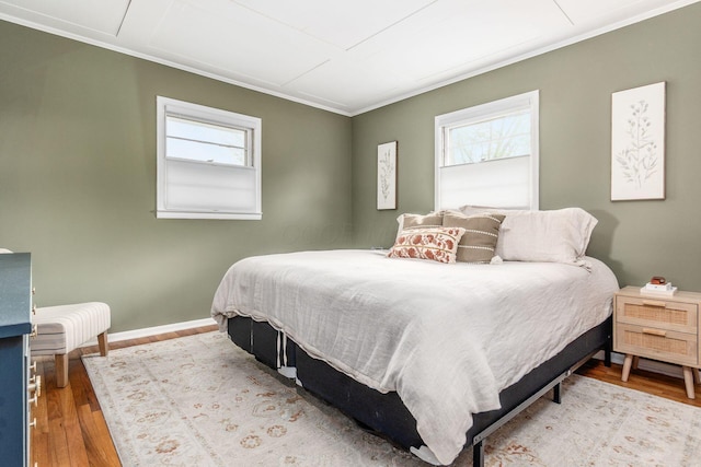 363 Cheyenne Dr, Westerville, OH 43081 - bedroom featuring wood finished floors, ornamental molding, and baseboards