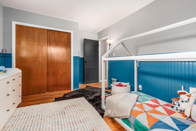 363 Cheyenne Dr, Westerville, OH 43081 - bedroom featuring wood finished floors, a closet, and a wainscoted wall