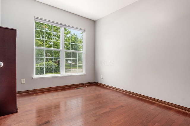 6923 Bishops Crossing Cir, Dublin, OH 43016 - unfurnished room featuring hardwood / wood-style floors and baseboards