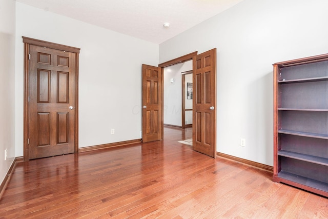 6923 Bishops Crossing Cir, Dublin, OH 43016 - unfurnished bedroom featuring light wood-style flooring