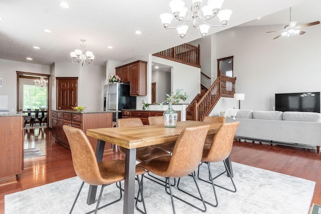 6923 Bishops Crossing Cir, Dublin, OH 43016 - dining space featuring a chandelier, recessed lighting, light wood finished floors, stairs, and ceiling fan
