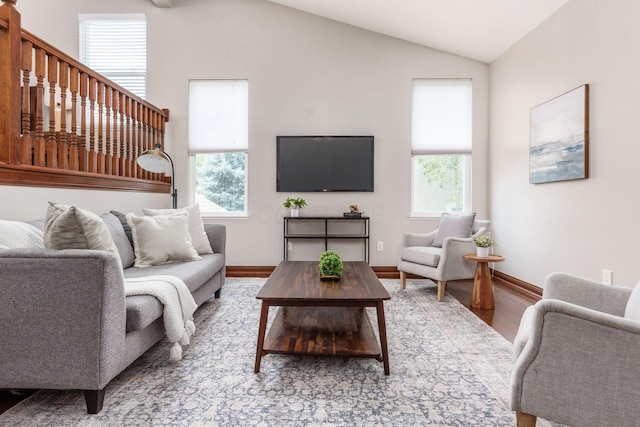 6923 Bishops Crossing Cir, Dublin, OH 43016 - living area with vaulted ceiling and wood finished floors