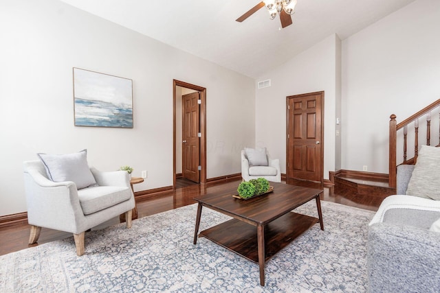 6923 Bishops Crossing Cir, Dublin, OH 43016 - living room with wood finished floors, lofted ceiling, stairs, and a ceiling fan