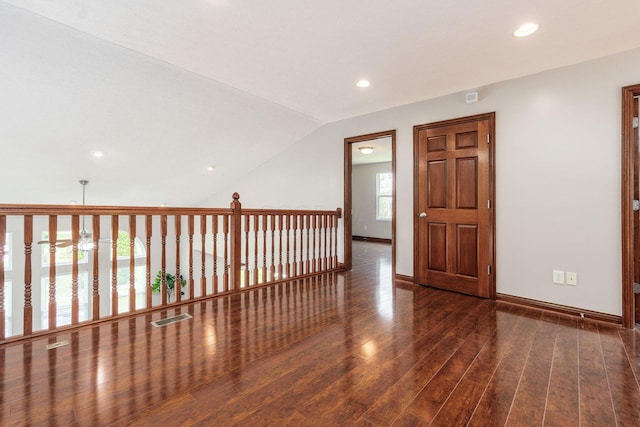 6923 Bishops Crossing Cir, Dublin, OH 43016 - hall with recessed lighting, wood finished floors, and vaulted ceiling