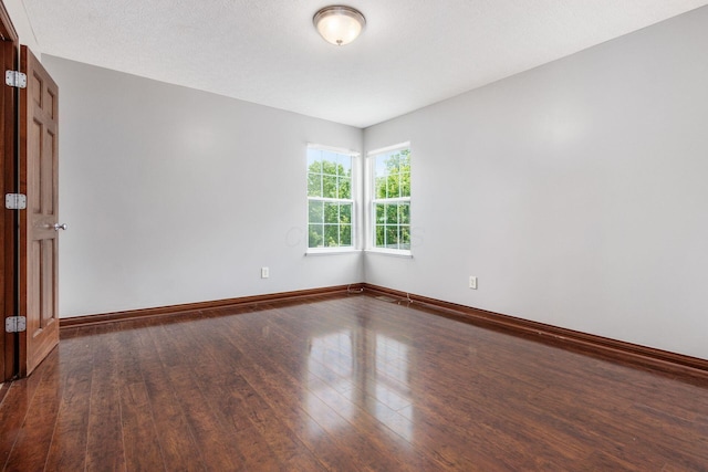 6923 Bishops Crossing Cir, Dublin, OH 43016 - unfurnished room with wood-type flooring and baseboards