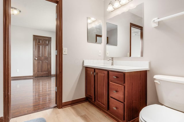 6923 Bishops Crossing Cir, Dublin, OH 43016 - half bathroom featuring wood finished floors and vanity